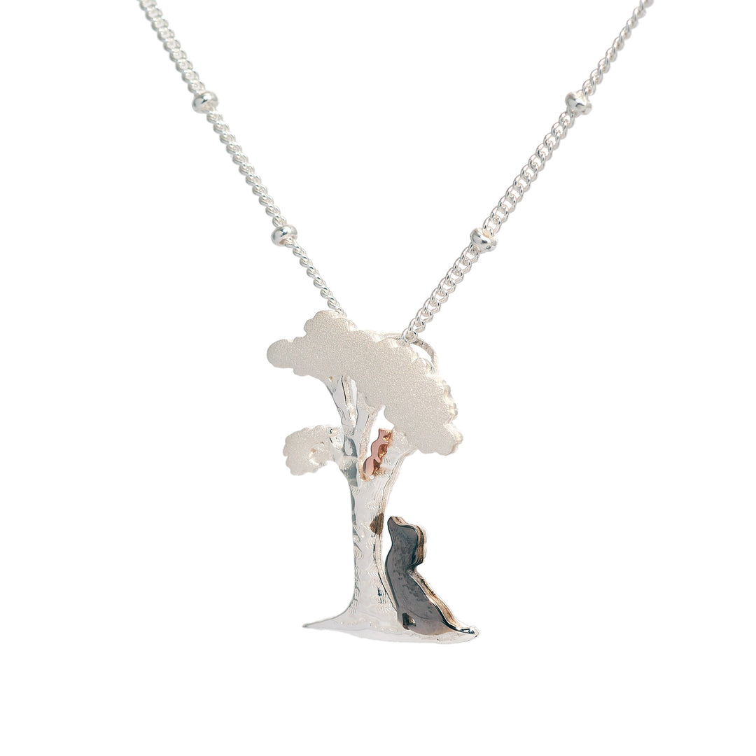 Dog Under The Tree Pendant