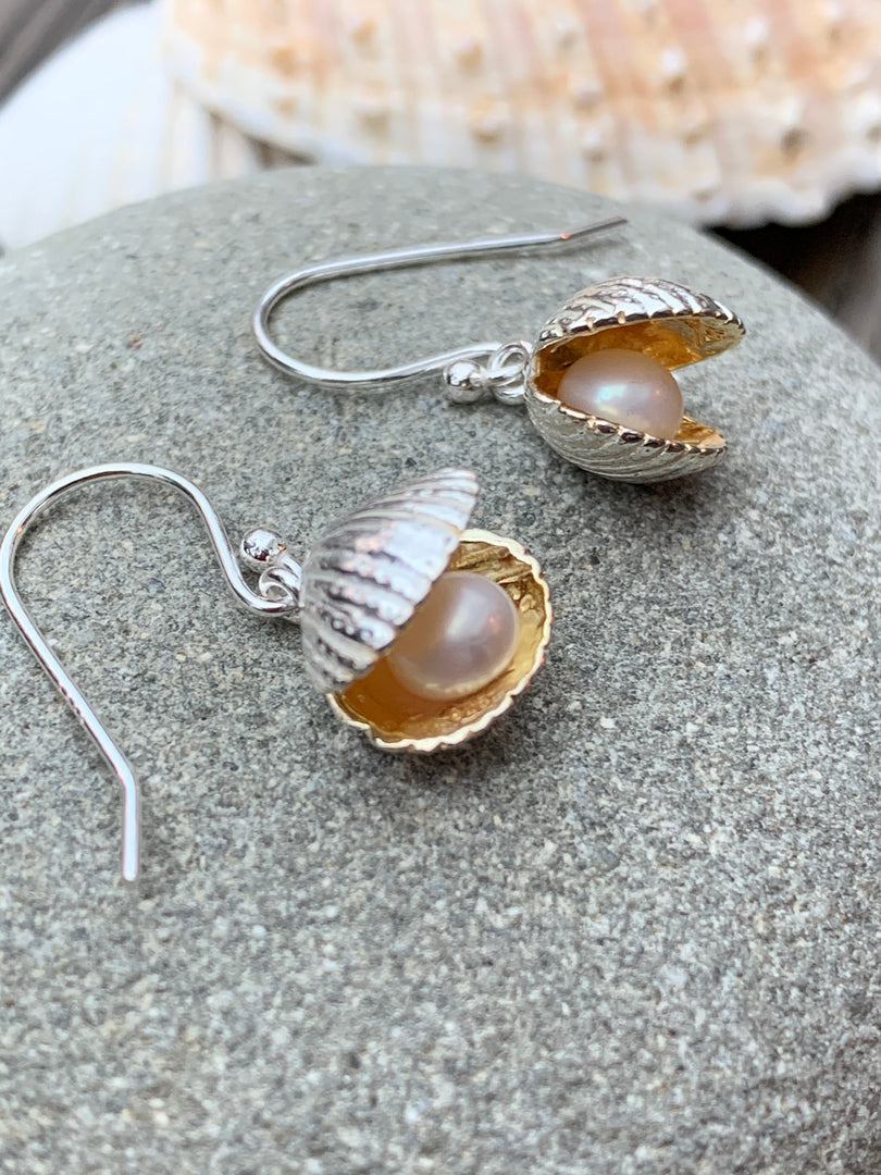 Shell with pearl earrings