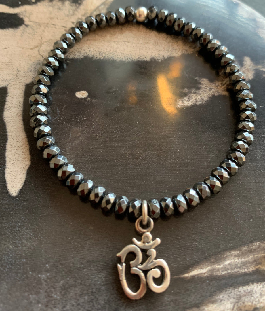 Hematite Bracelet With Ohm Charm