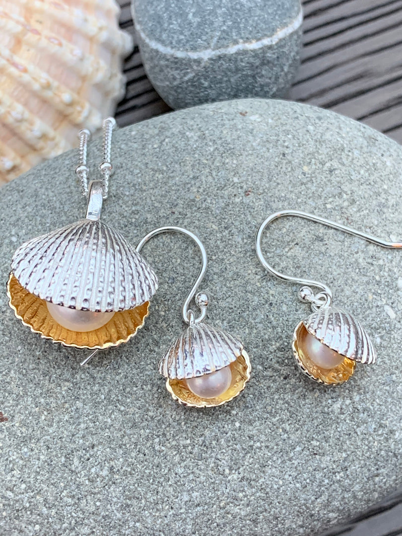 Shell with pearl earrings